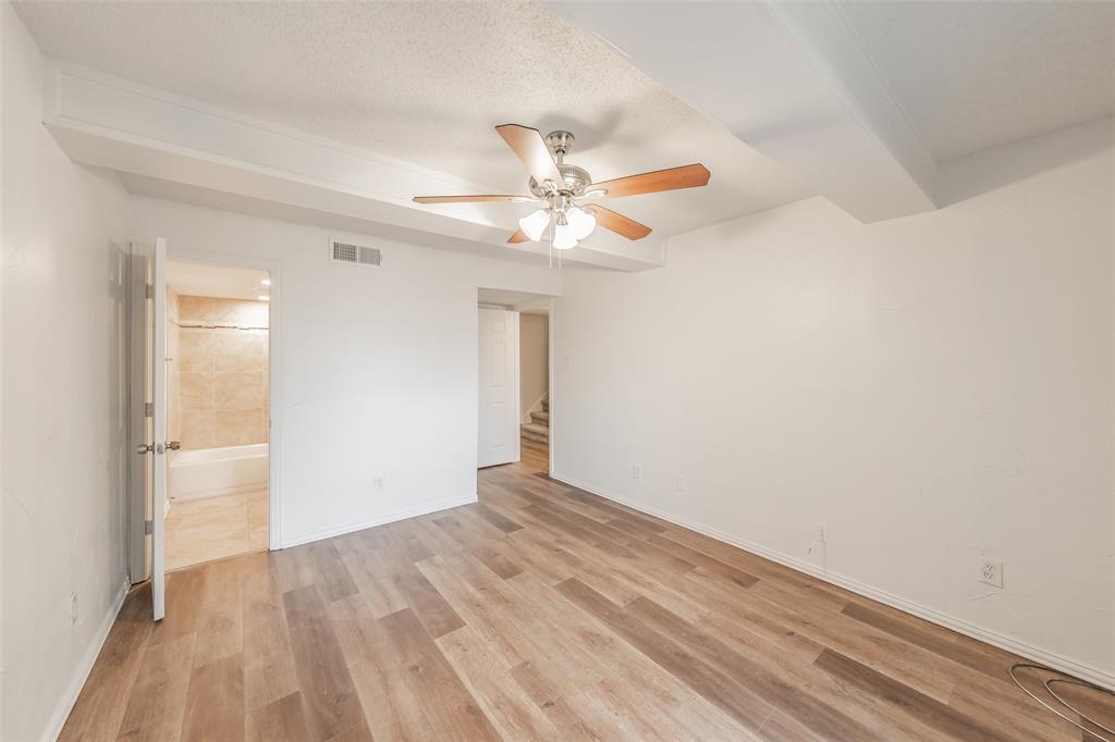 9999 Boat Club Road, Unit 311 Fort Worth, TX 76179 - Photo 24 of 25 wooden floor in an empty room
