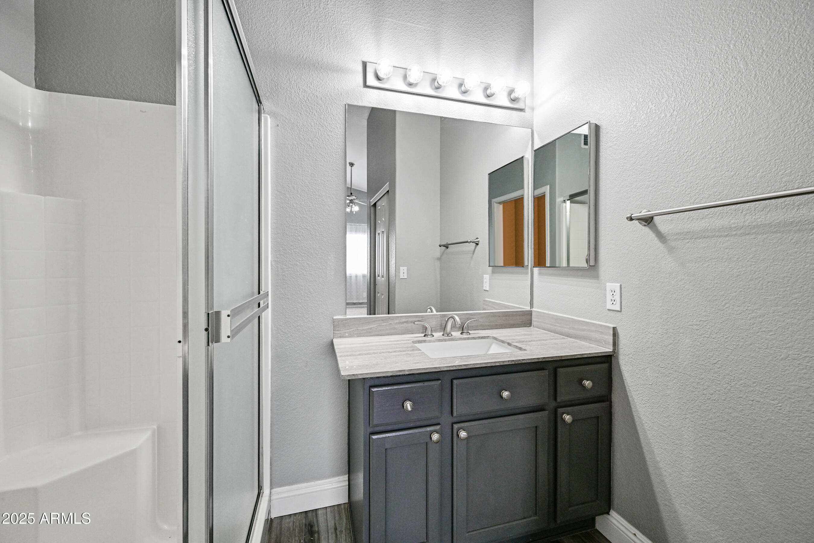 726 South Nebraska Street, Unit 91 Chandler, AZ 85225 - Photo 16 of 20 a bathroom with a sink and a mirror