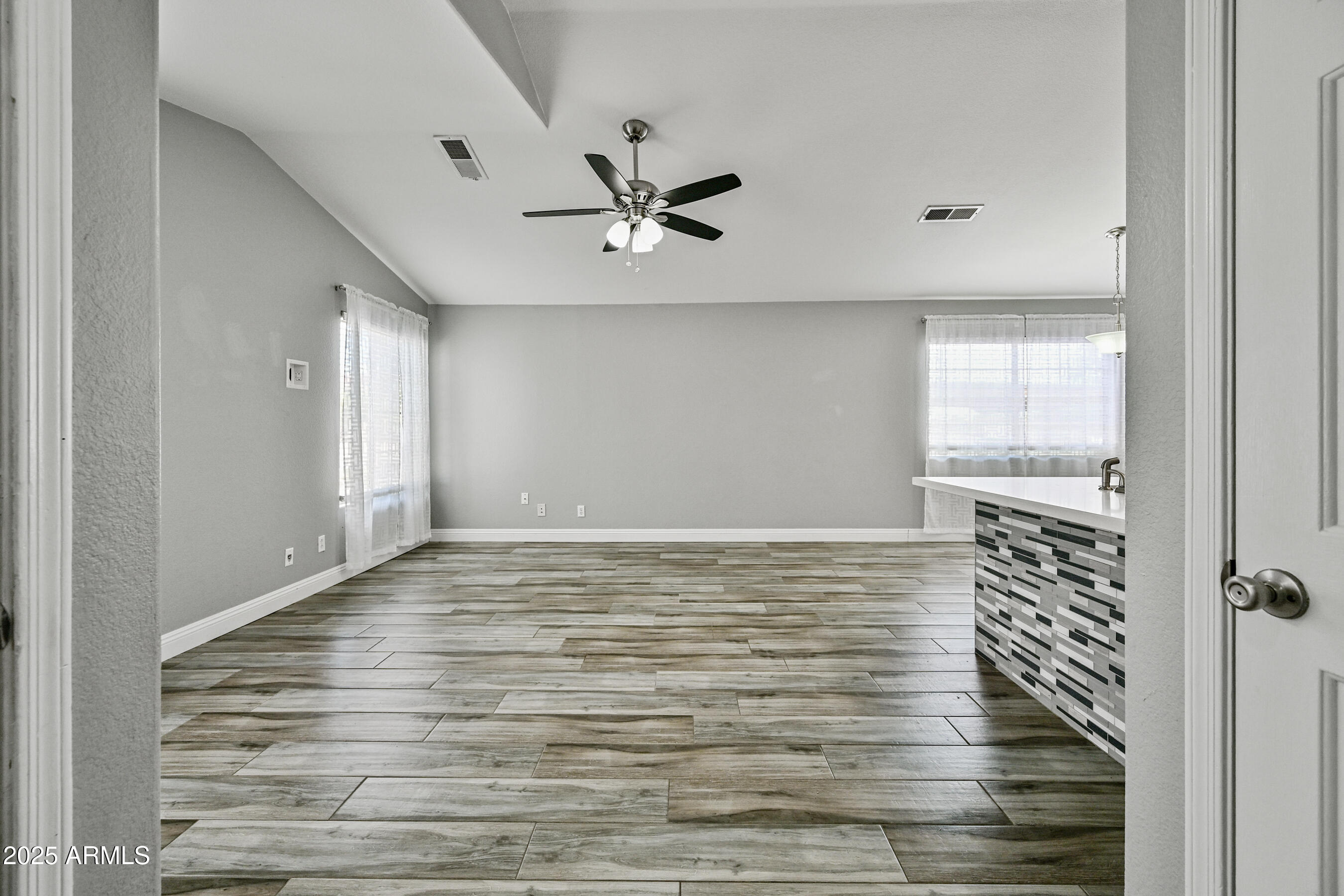 726 South Nebraska Street, Unit 91 Chandler, AZ 85225 - Photo 3 of 20 a view of an empty room with a window
