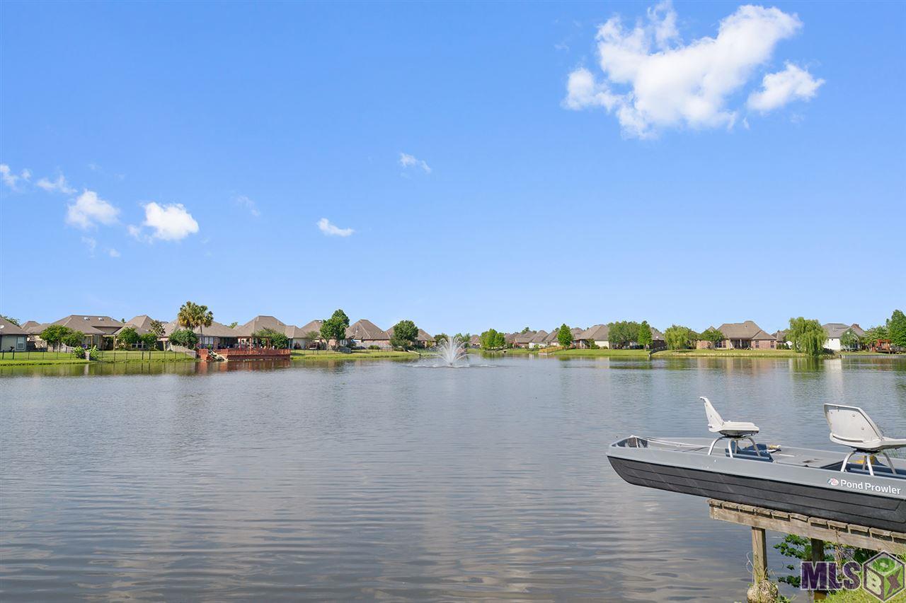10787 Springtree Avenue Baton Rouge, LA 70810 - Photo 14 of 14 Veiw of lake with small deck in rear of yard