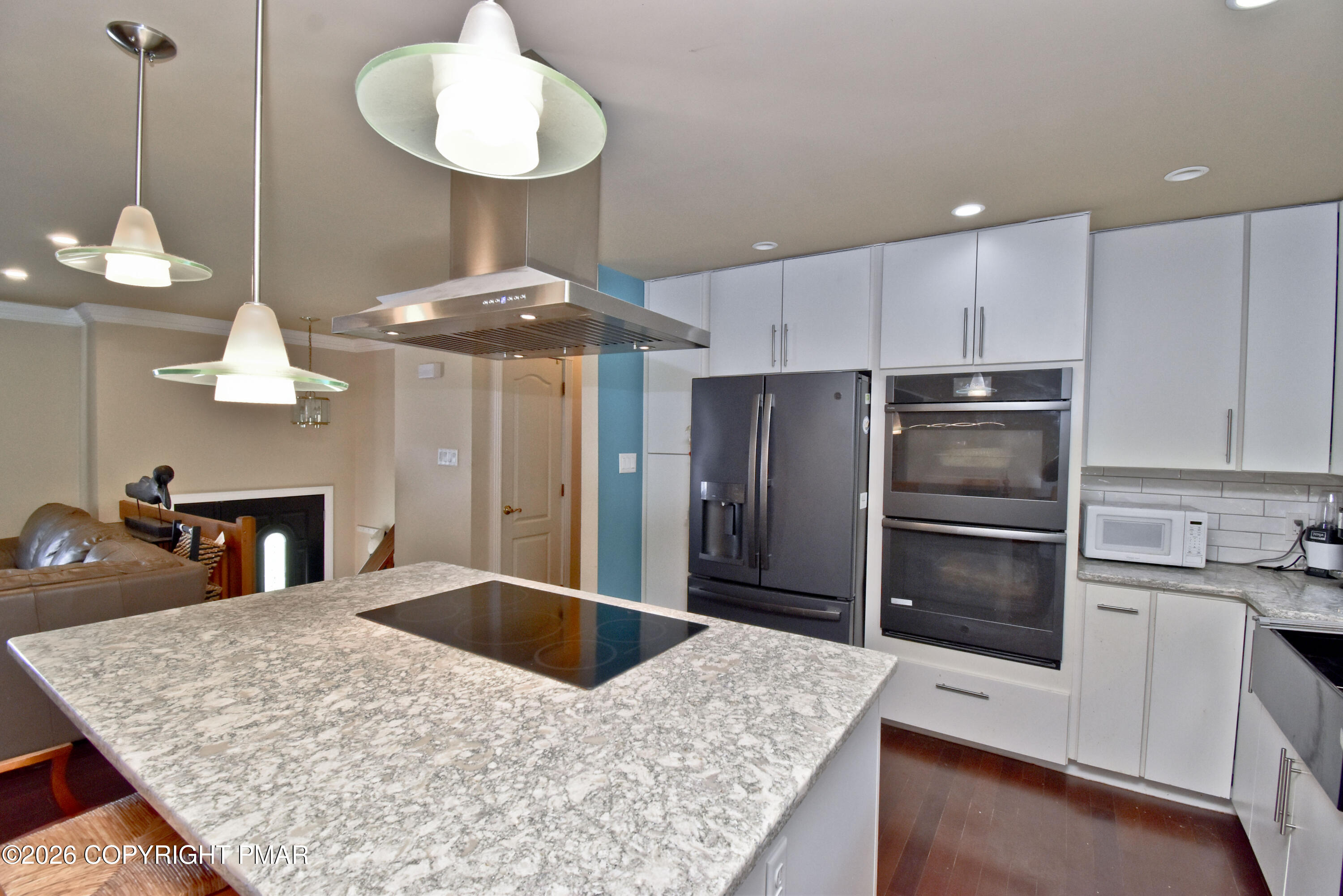 2106 Smith Road Stroudsburg, PA 18360 - Photo 10 of 34 a kitchen with stainless steel appliances granite countertop a sink a refrigerator and a stove