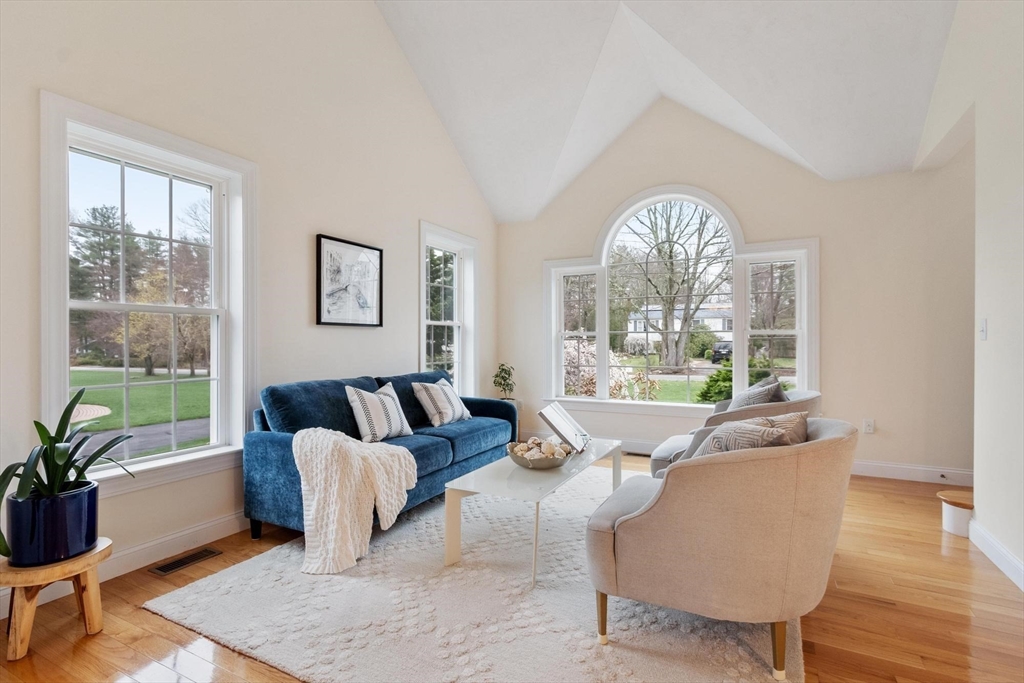 4 Henley Road Acton, MA 01720 - Photo 14 of 32 a living room with furniture and a large window