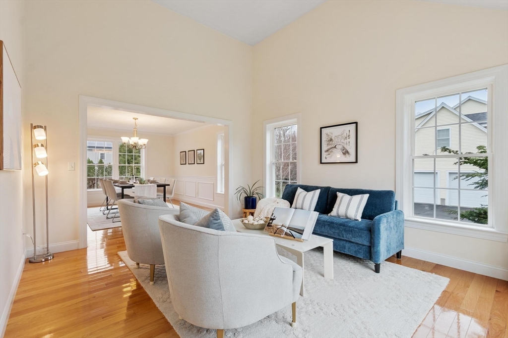 4 Henley Road Acton, MA 01720 - Photo 15 of 32 a living room with furniture and a large window
