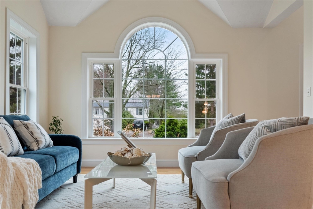 4 Henley Road Acton, MA 01720 - Photo 16 of 32 a living room with furniture and a large window