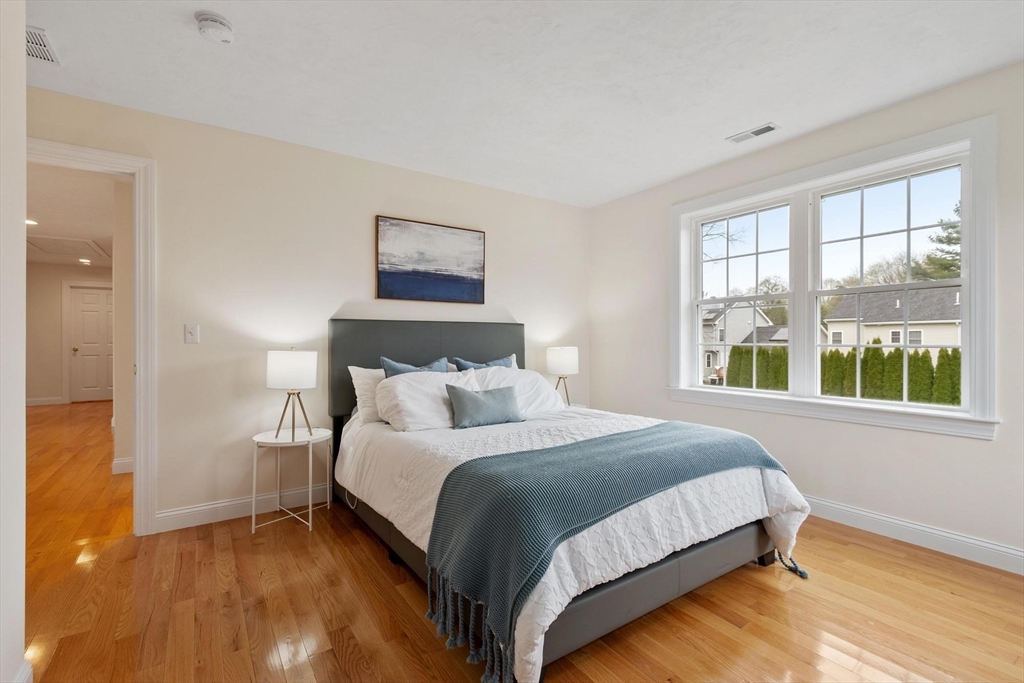 4 Henley Road Acton, MA 01720 - Photo 26 of 32 a bedroom with a bed and a window
