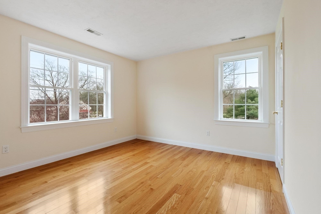 4 Henley Road Acton, MA 01720 - Photo 30 of 32 a view of an empty room with a window