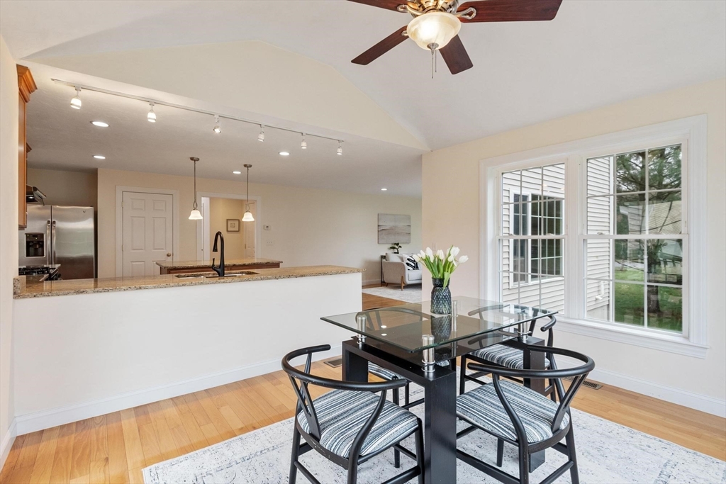 4 Henley Road Acton, MA 01720 - Photo 8 of 32 a view of a dining room with furniture and a large window