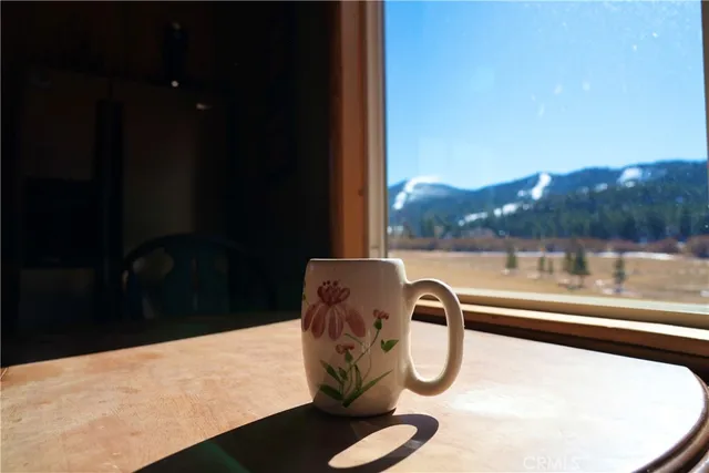 a kitchen with stainless steel appliances granite countertop a stove a sink a microwave and a refrigerator