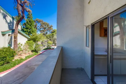 a view of a house with a tree
