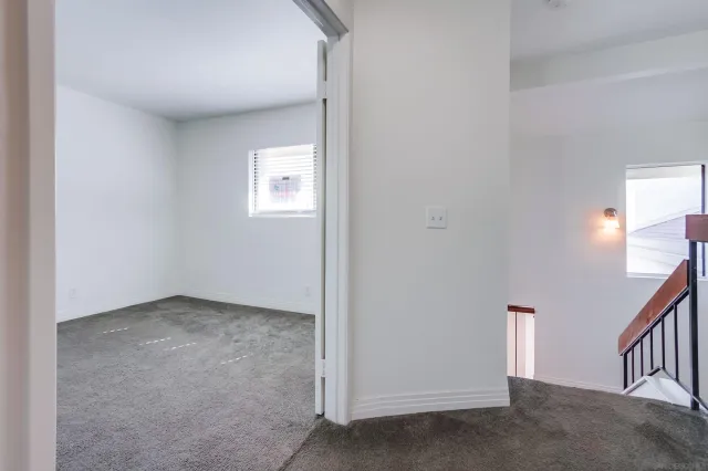 a bathroom with a sink vanity and mirror