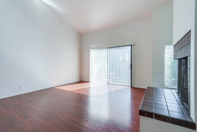 a view of a livingroom with wooden floor