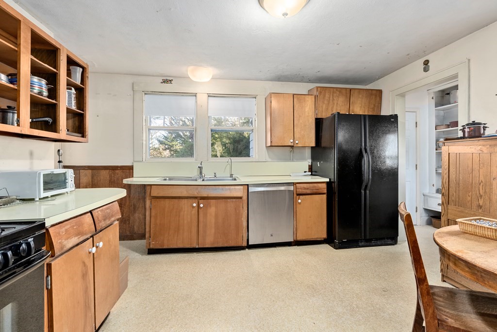 25 Francis Road Wellesley, MA 02482 - Photo 11 of 11 a kitchen with a sink refrigerator and window