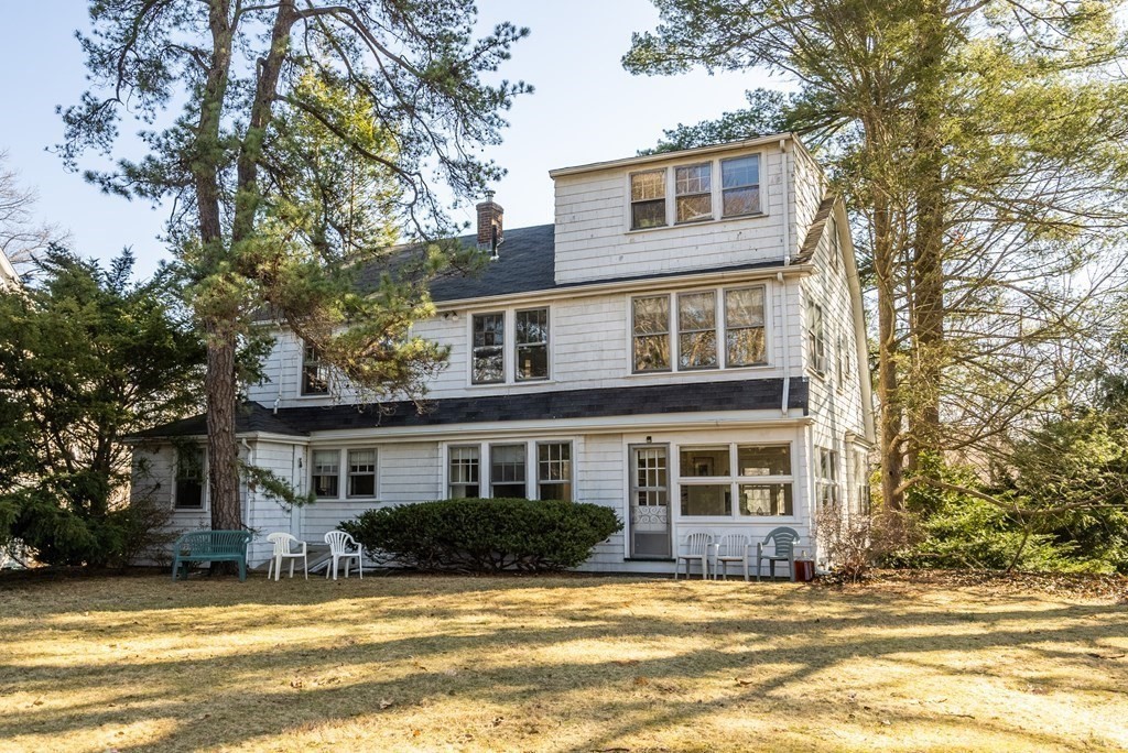 25 Francis Road Wellesley, MA 02482 - Photo 6 of 11 a view of a house with a swimming pool