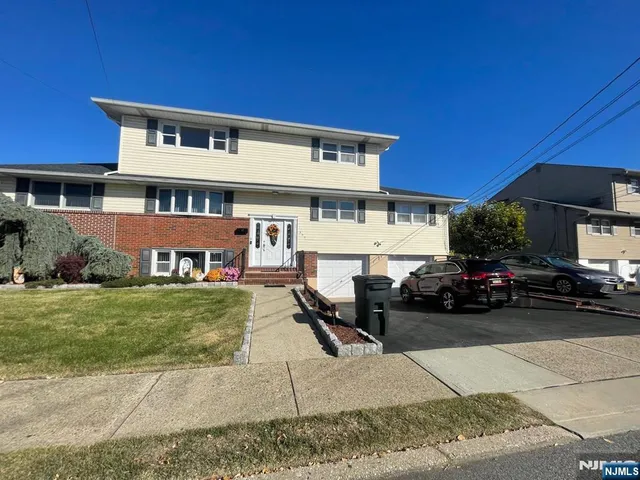 a car parked in front of a house
