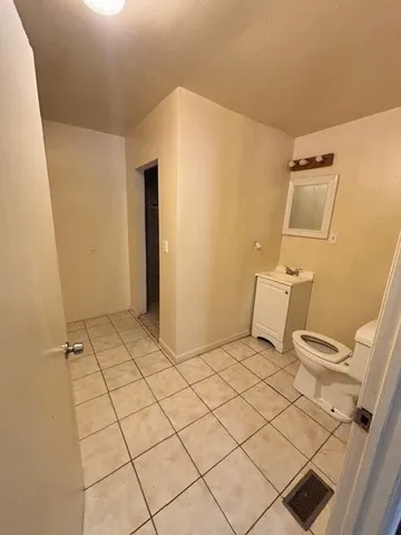 a bathroom with a sink and toilet