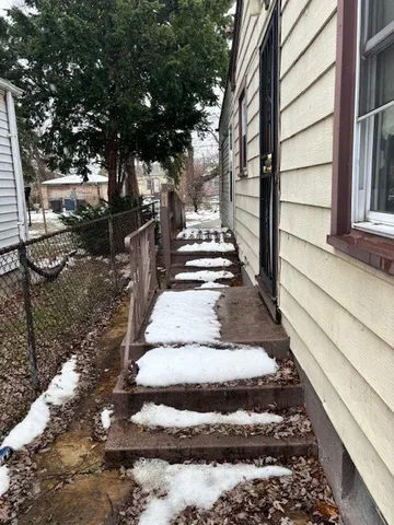 a view of a backyard with sitting area