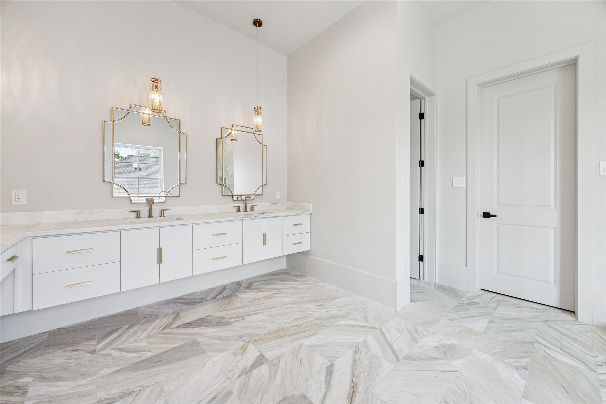 7203 Tickner Street Houston, TX 77055 - Photo 26 of 43 a spacious bathroom with a double vanity sink mirror and
