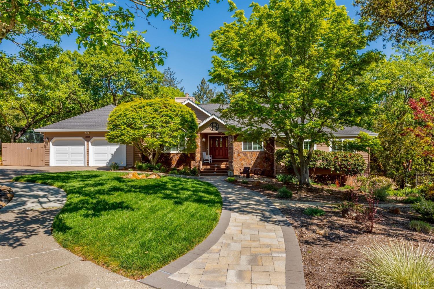 3214 Cobblestone Drive Santa Rosa, CA 95404 - Photo 1 of 1 a front view of a house with garden