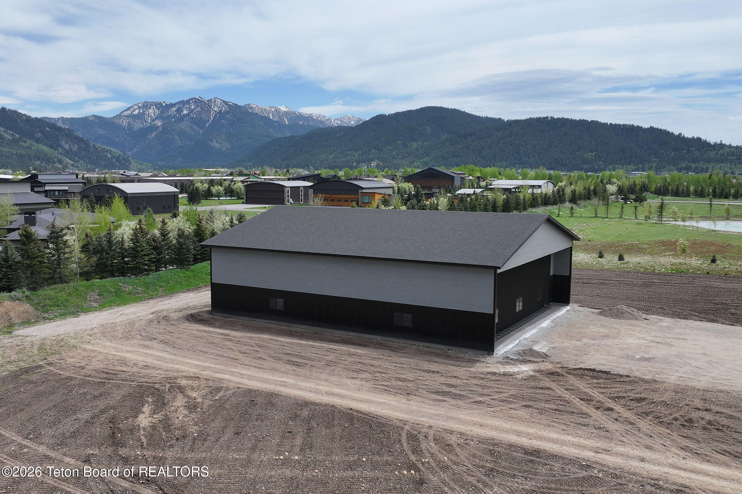 331 Funk Fairway Alpine, WY 83128 - Photo 5 of 12 Lot_9_Refuge_West_Exterior_SE_C_lo