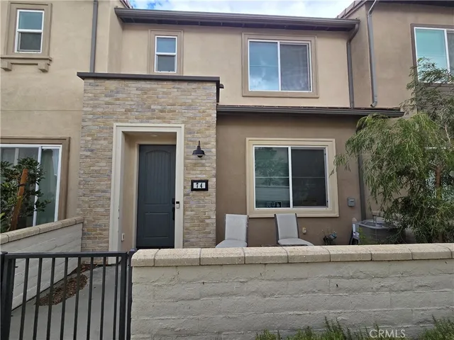 a house view with a outdoor space