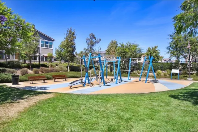 a view of a backyard with sitting area