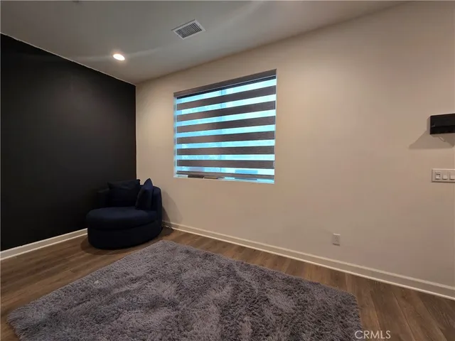 a room with a couch and a window