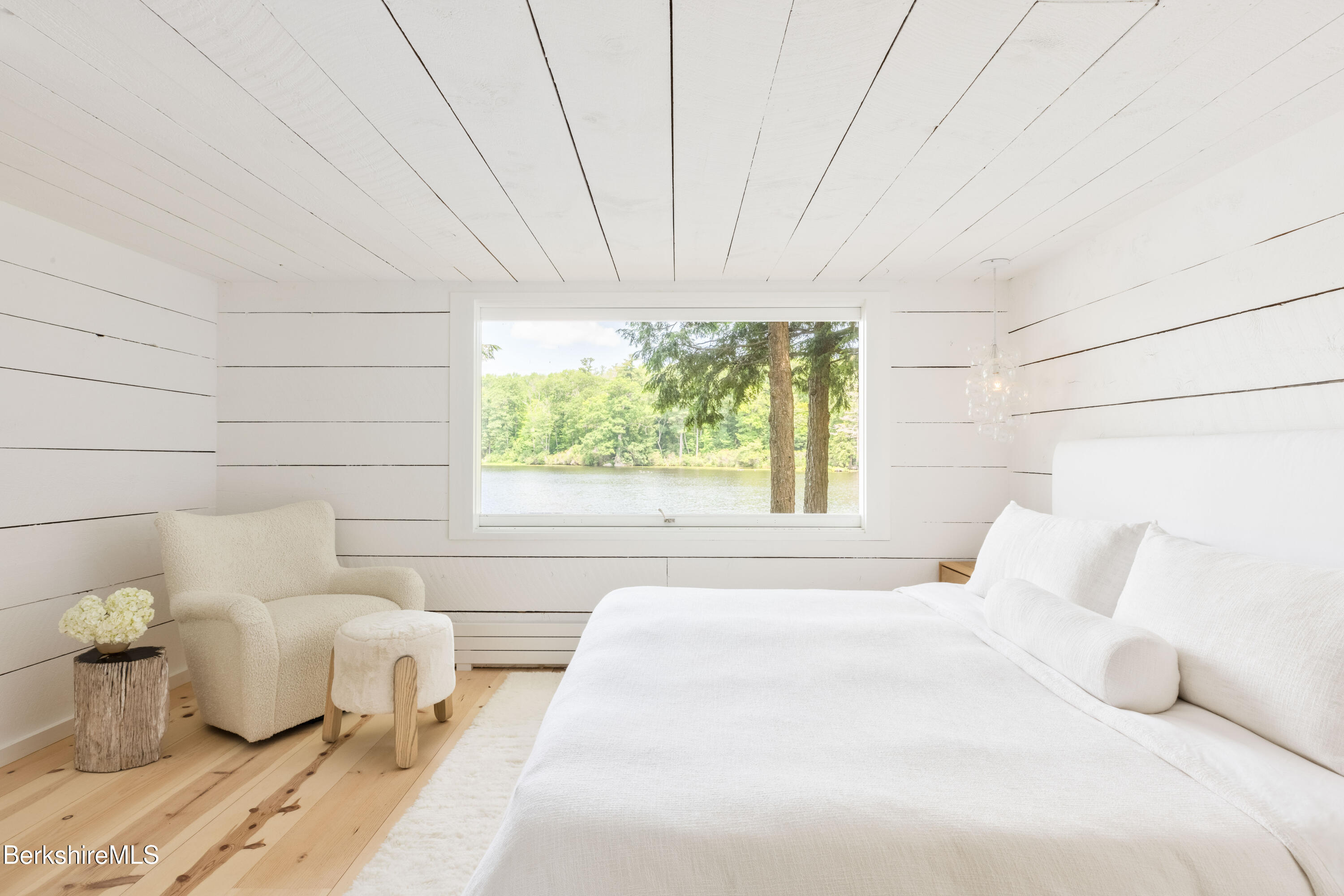 14 Sullivan Road Sandisfield, MA 01255 - Photo 11 of 54 a bedroom with a bed and a large window