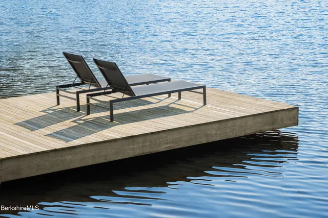 a terrace of a house with outdoor seating