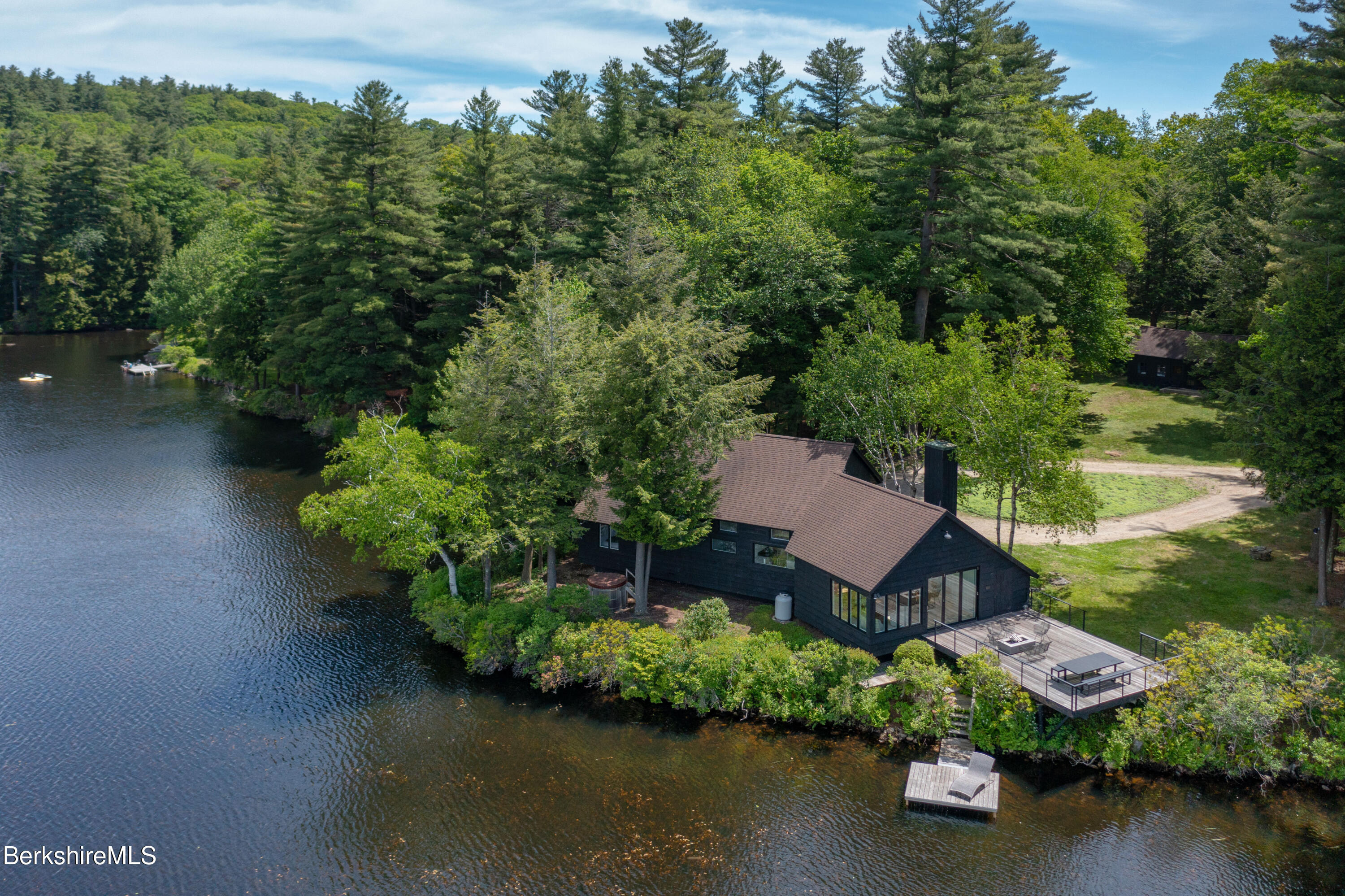 14 Sullivan Road Sandisfield, MA 01255 - Photo 3 of 54 an aerial view of a house with garden space and lake view
