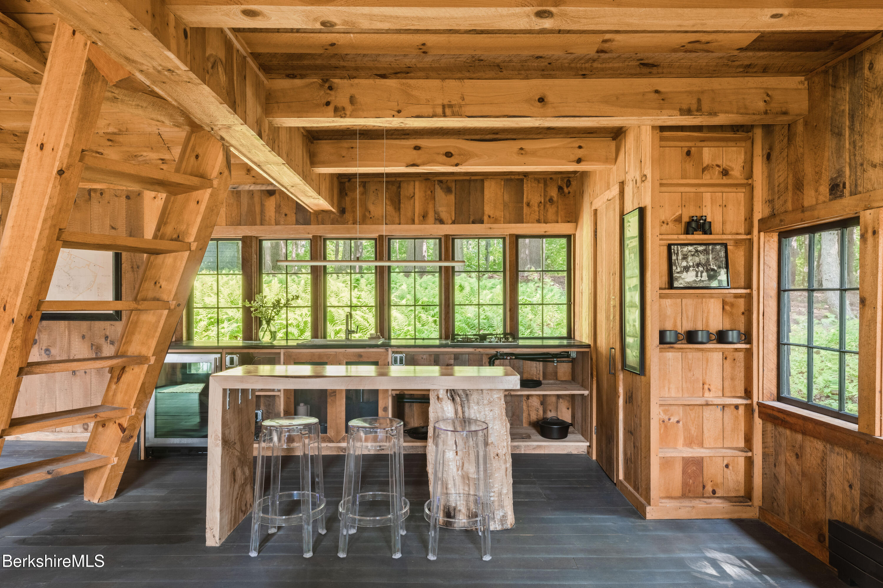 14 Sullivan Road Sandisfield, MA 01255 - Photo 34 of 54 a view of a dining room with furniture and wooden floor