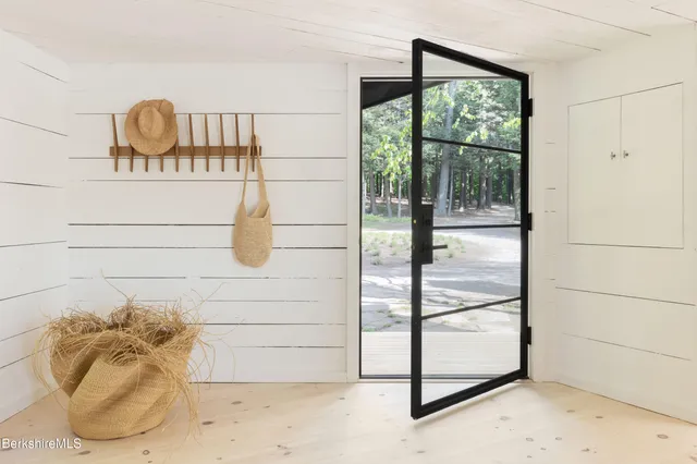 a kitchen that has a stove and a table