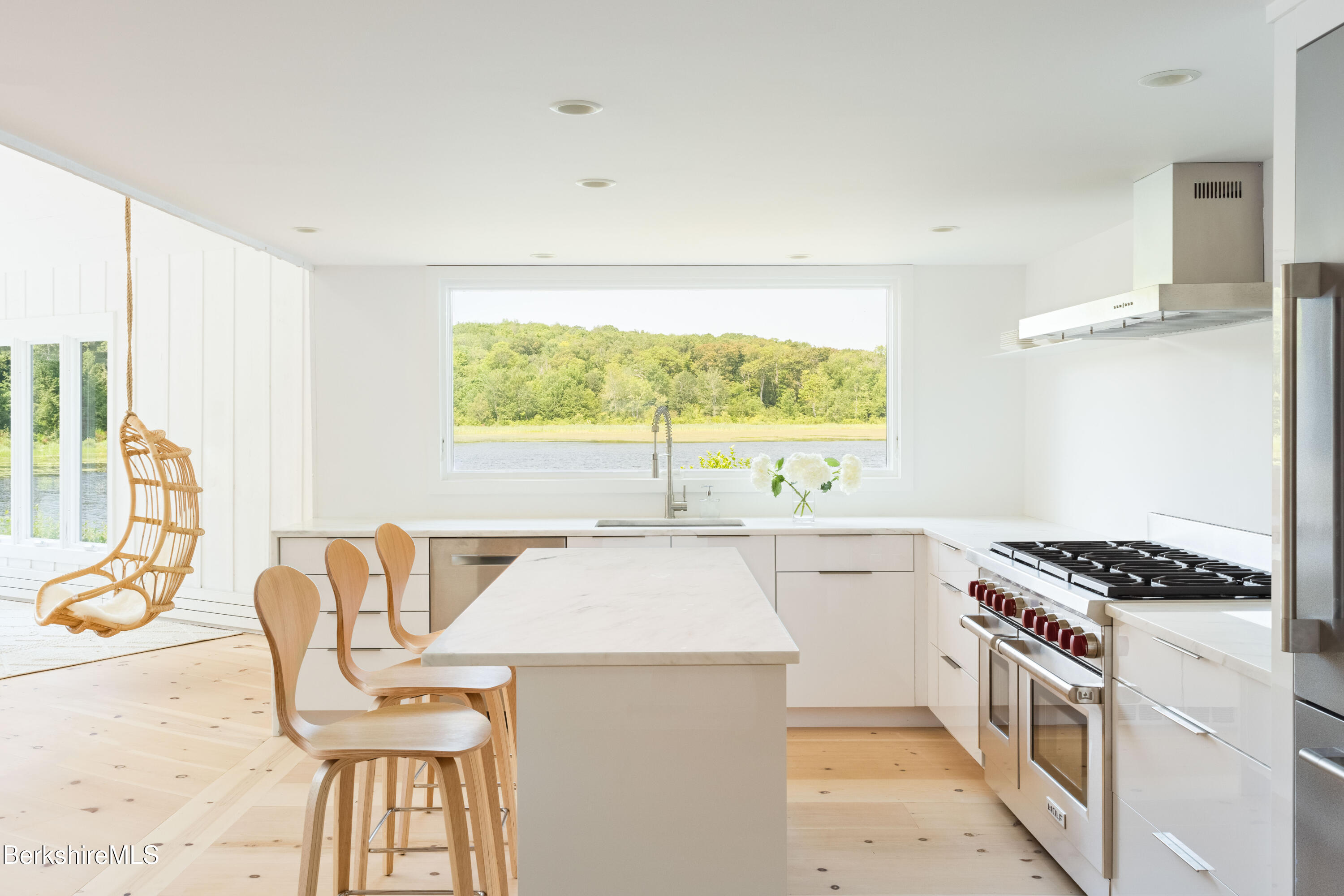 14 Sullivan Road Sandisfield, MA 01255 - Photo 5 of 54 a kitchen that has a stove and a table