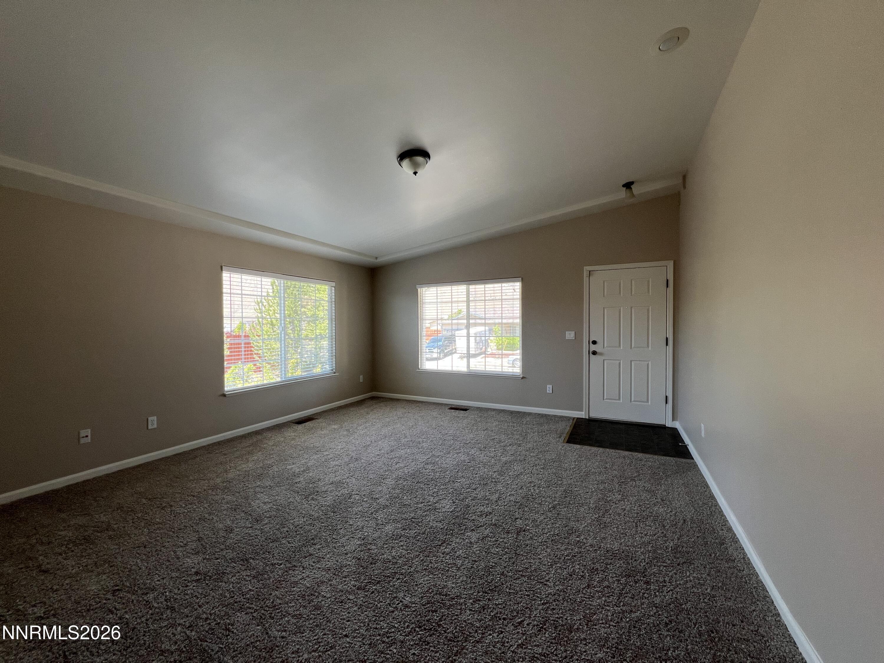 18406 Teddy Bear Court Reno, NV 89508 - Photo 4 of 44 an empty room with windows