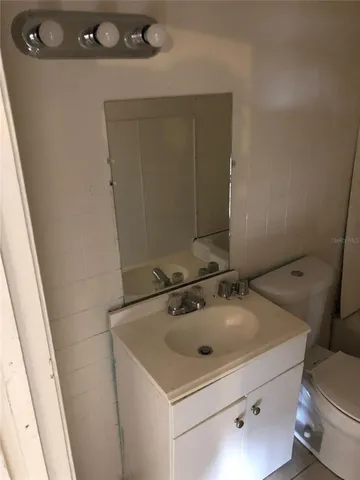 a bathroom with a sink and a toilet