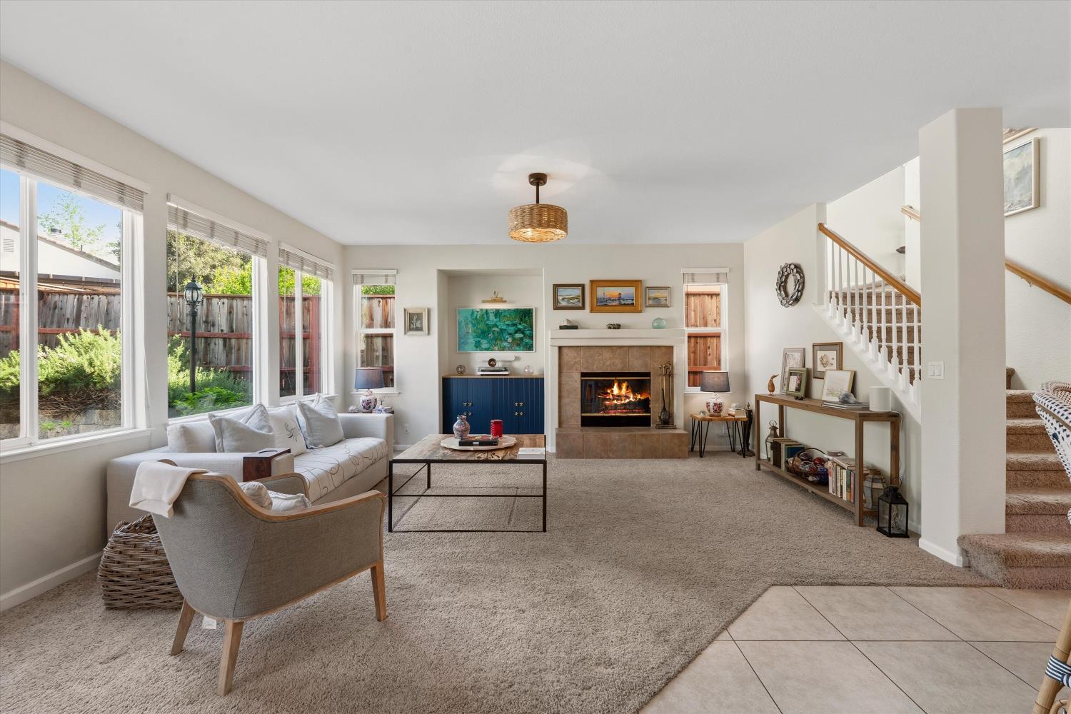 6503 Turnstone Way Rocklin, CA 95765 - Photo 13 of 42 a living room with furniture and a fireplace