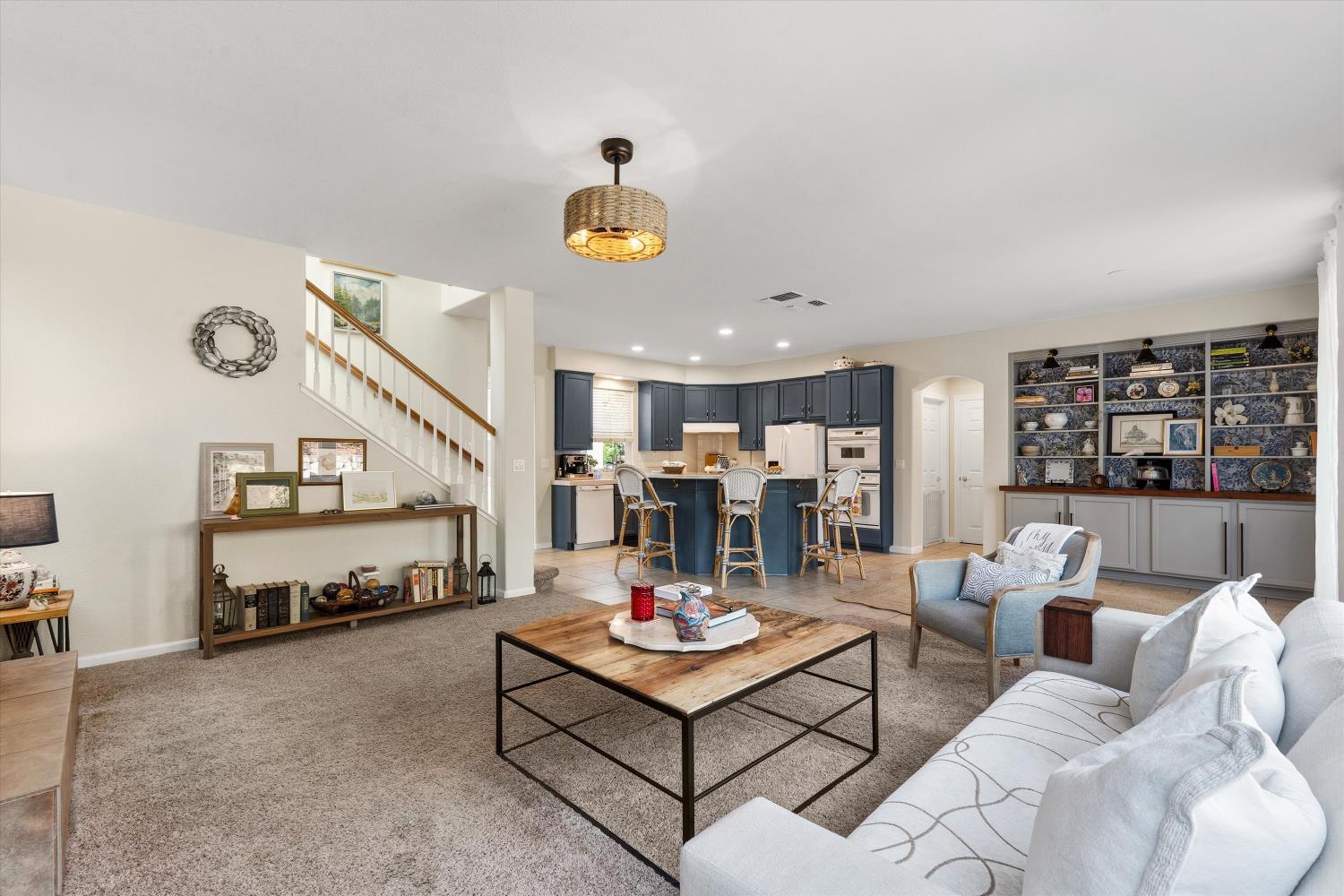 6503 Turnstone Way Rocklin, CA 95765 - Photo 14 of 42 a living room with furniture and a table