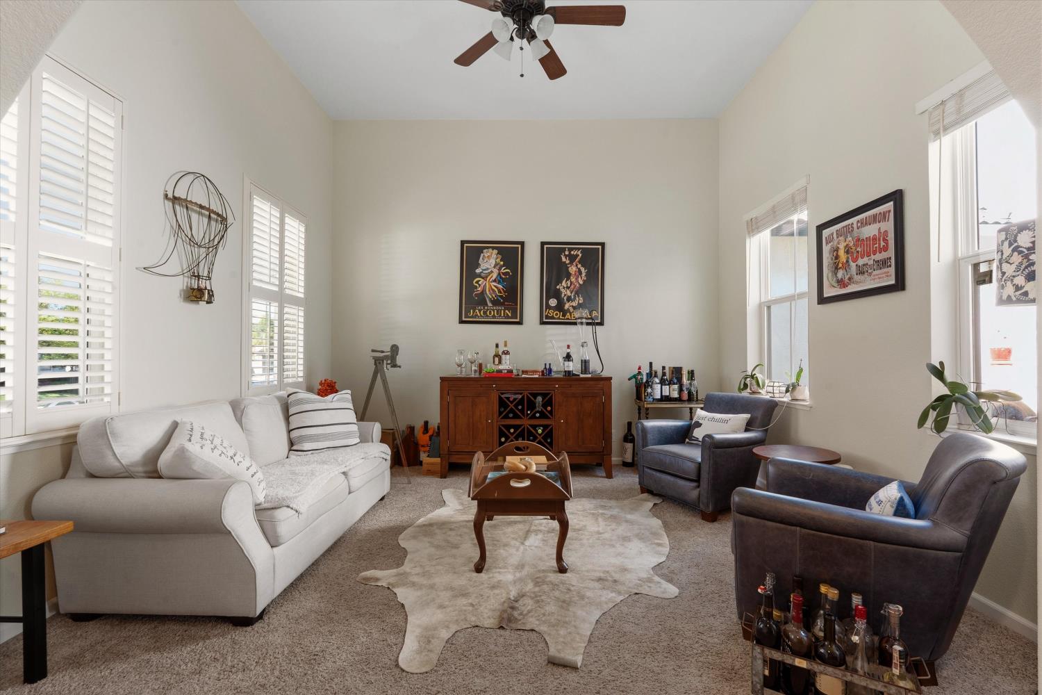 6503 Turnstone Way Rocklin, CA 95765 - Photo 7 of 42 a living room with furniture or couch and a flat screen tv