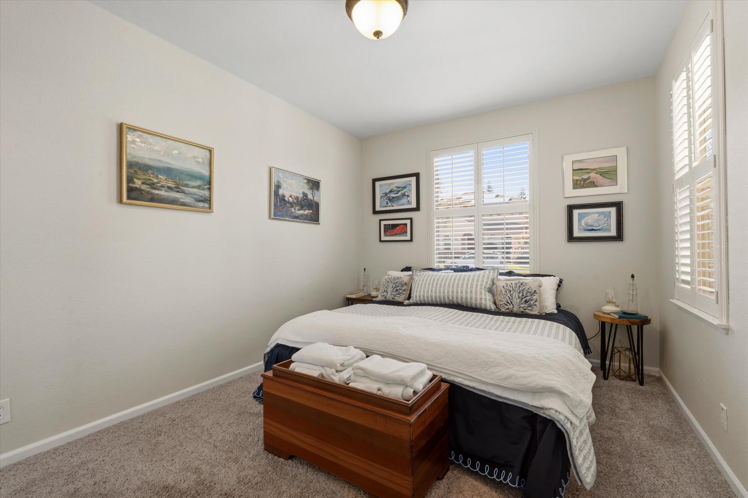 6503 Turnstone Way Rocklin, CA 95765 - Photo 9 of 42 a bedroom with a bed and a window