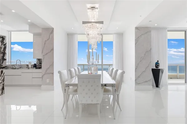 a view of a dining room with furniture