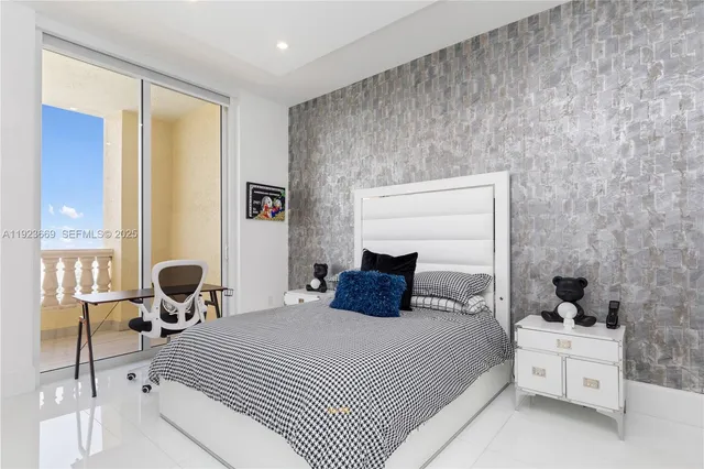 a kitchen with stainless steel appliances sink refrigerator and cabinets