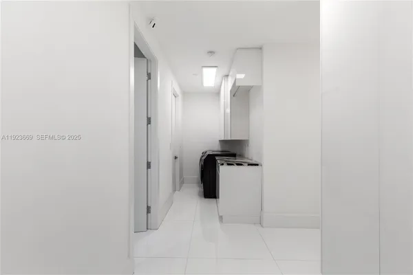 a bedroom with a bed and a walk in closet