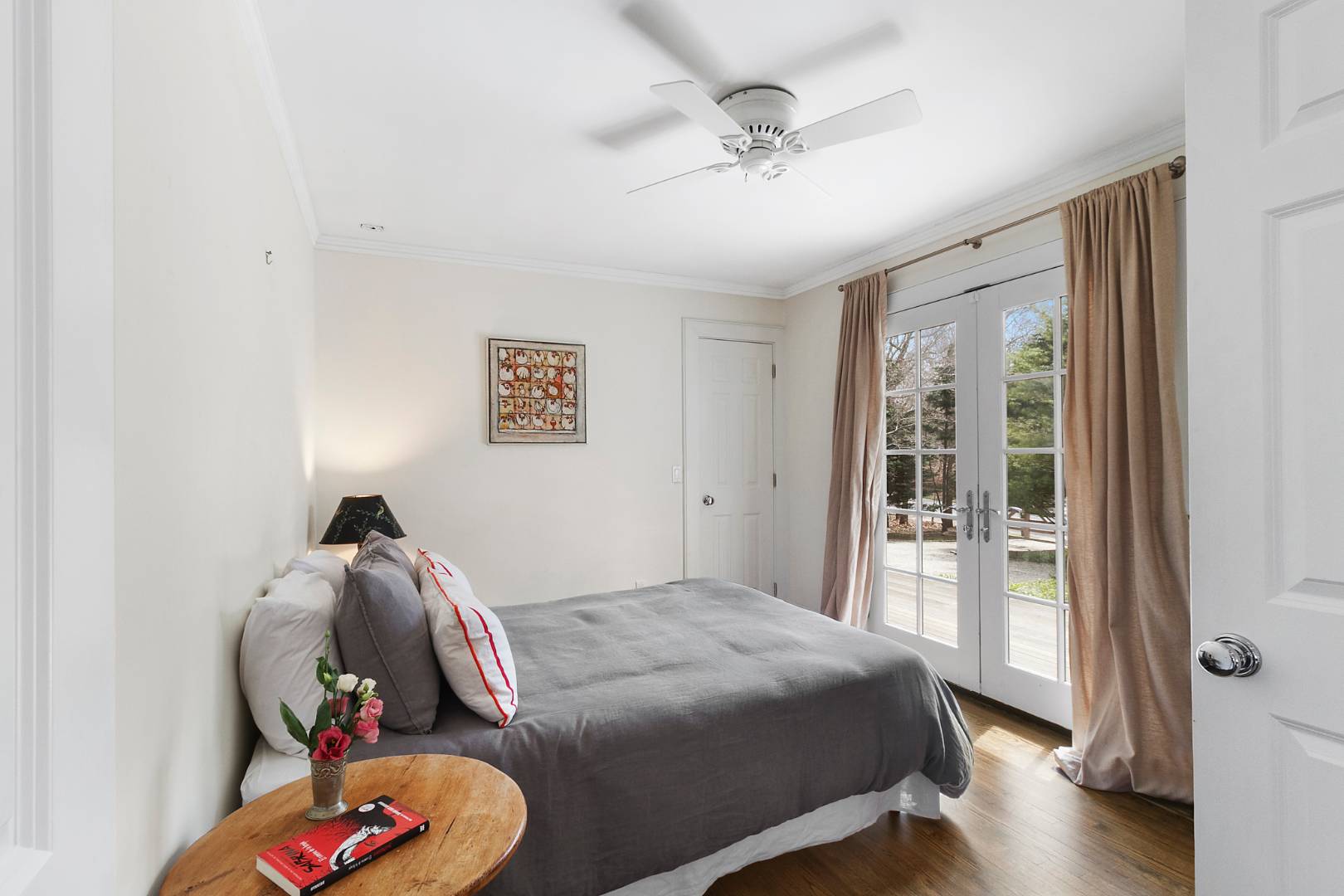 334 Brick Kiln Road Sag Harbor, NY 11963 - Photo 12 of 18 a bedroom with a bed and wooden floor