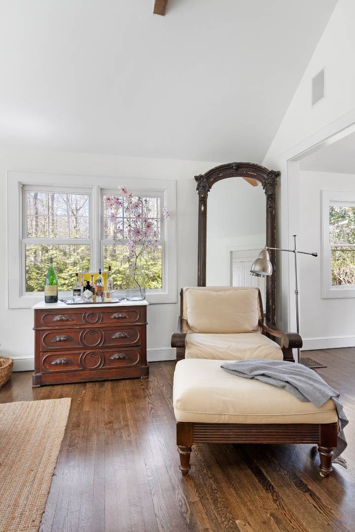 334 Brick Kiln Road Sag Harbor, NY 11963 - Photo 14 of 18 a bedroom with a bed and a dresser