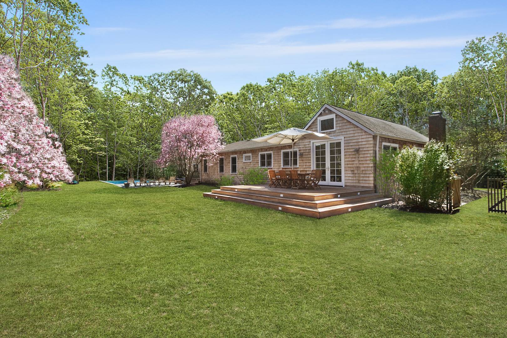 334 Brick Kiln Road Sag Harbor, NY 11963 - Photo 5 of 18 a front view of a house with garden