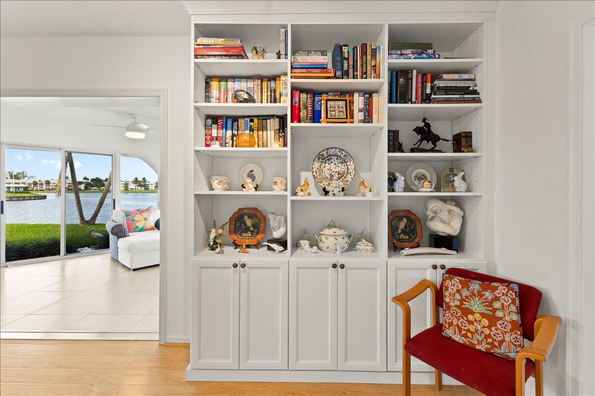 233 Rio Vista Circle Atlantis, FL 33462 - Photo 17 of 38 a room with a book shelf and a book shelf
