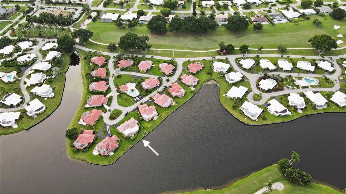 233 Rio Vista Circle Atlantis, FL 33462 - Photo 36 of 38 view of a lake with an outdoor space