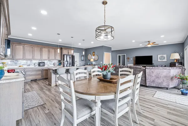 a kitchen with lots of counter top space and living room
