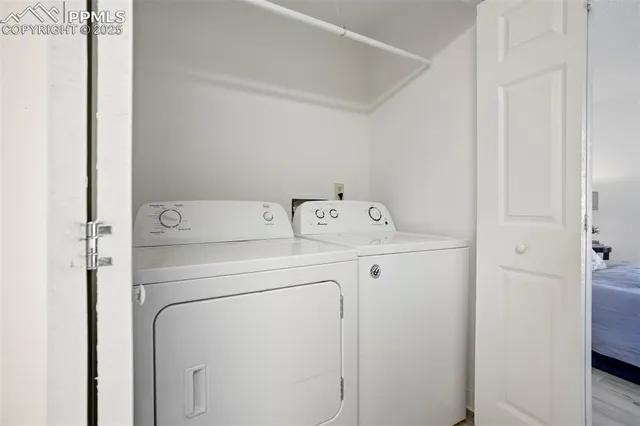 a utility room with dryer and washer
