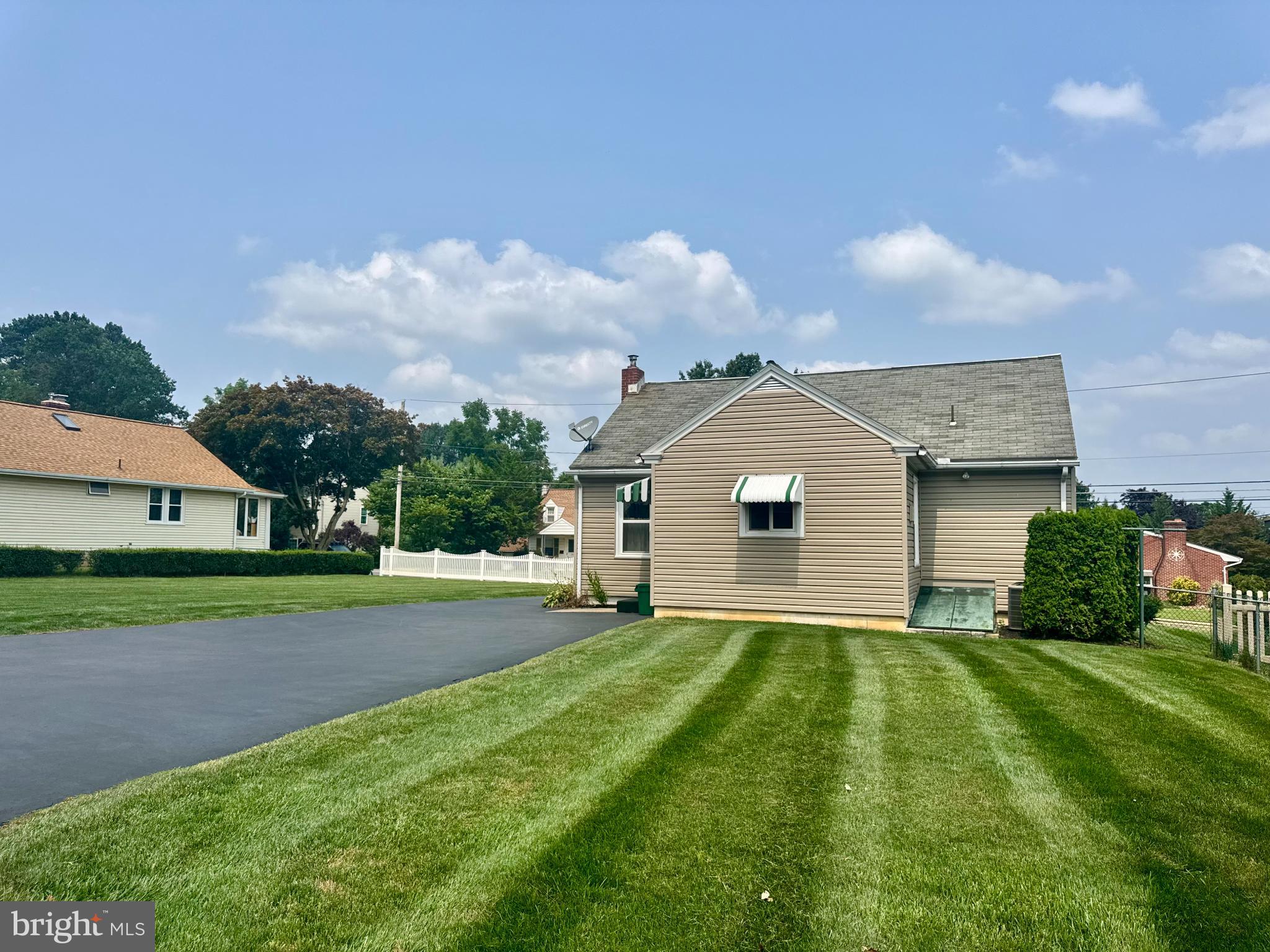 41 Plum Street Lititz, PA 17543 - Photo 2 of 8 a front view of a house with a yard and garage