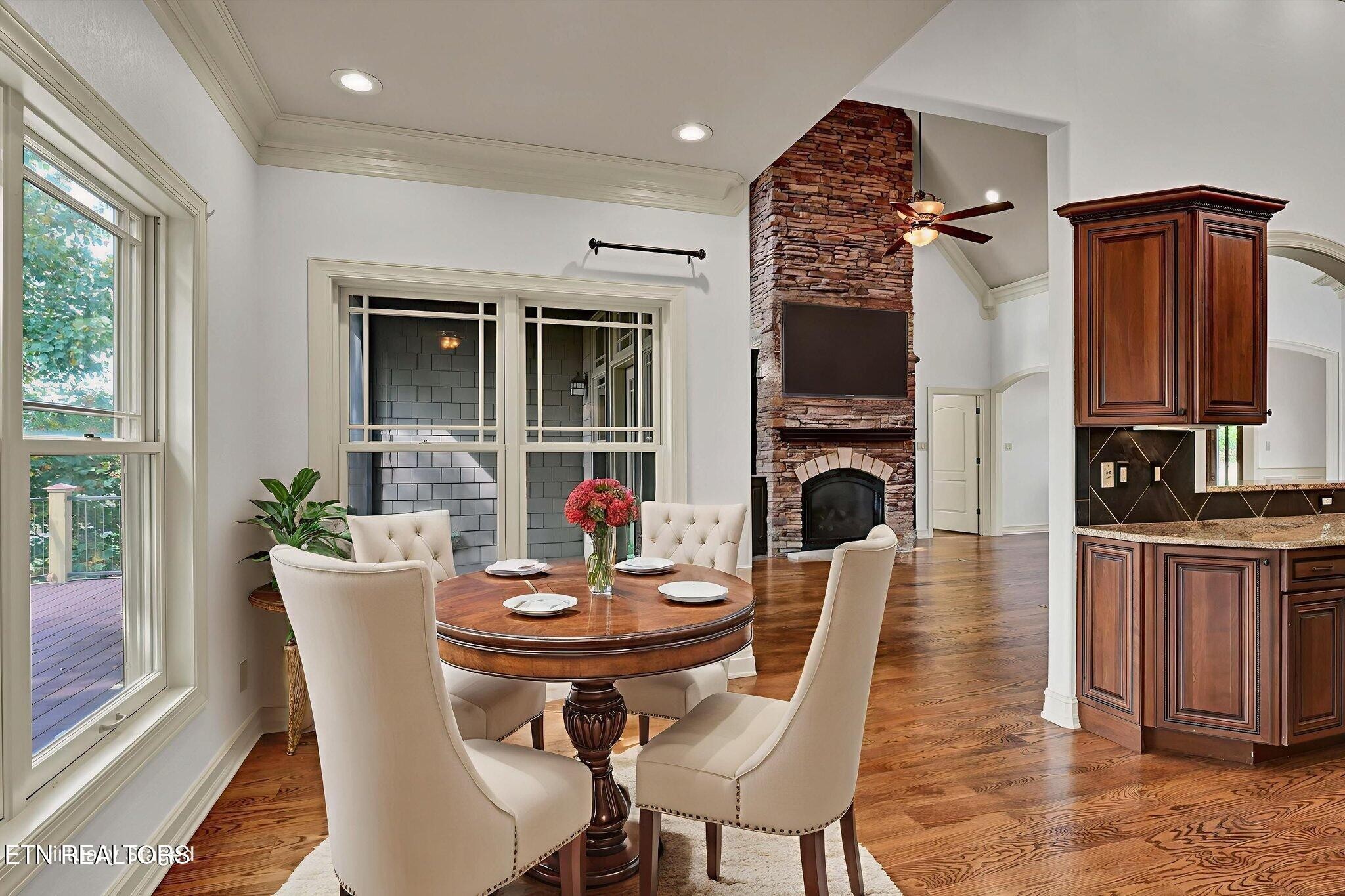 494 Chestnut Lane Loudon, TN 37774 - Photo 18 of 58 a view of a dining room with furniture window and wooden floor